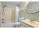 Full bath features shower, toilet, sink and vanity, and wall mirror for personal care at 4705 Walden Pond Dr # 110-C, Raleigh, NC 27604