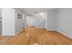 Hardwood floors, combined living room, dining room, and kitchen provide ideal flow and natural light at 4705 Walden Pond Dr # 110-C, Raleigh, NC 27604