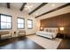 Spacious main bedroom with accent wall, recessed lighting, and large windows at 500 Grigsby Ave, Holly Springs, NC 27540