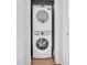 Convenient laundry closet featuring a stacked washer and dryer unit at 500 Spruce St, Durham, NC 27703