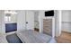 Comfortable main bedroom with an ensuite bath, large dresser, and walk-in closet at 500 Spruce St, Durham, NC 27703