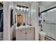 Chic bathroom featuring a modern vanity, updated shower and fixtures at 5316 Tanglewood Pine Ln, Raleigh, NC 27610