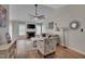 Bright living room with vaulted ceilings, fireplace, ceiling fan and hardwood floors at 5316 Tanglewood Pine Ln, Raleigh, NC 27610