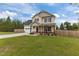 Attractive two-story home with well-maintained lawn and an attached garage at 576 Prairie Ln, Lillington, NC 27546