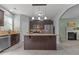 Open kitchen featuring granite countertops, stainless steel appliances, and center island with pendant lighting at 576 Prairie Ln, Lillington, NC 27546