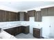 New kitchen with modern cabinets, white countertops, and sleek fixtures at 614 Tart Town Rd, Dunn, NC 28334