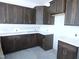 New kitchen with modern cabinets, white countertops, and sleek fixtures at 614 Tart Town Rd, Dunn, NC 28334