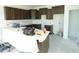 Spacious kitchen with central island, modern cabinets, and ample natural light at 614 Tart Town Rd, Dunn, NC 28334