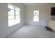 Bright room featuring board and batten accent wall and natural light at 614 Tart Town Rd, Dunn, NC 28334