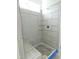 Modern bathroom shower with stylish tile design and glass shelving at 614 Tart Town Rd, Dunn, NC 28334