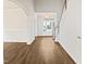 Welcoming entryway with hardwood floors and double doors that provide natural light at 617 Hiddenbrook Dr, Durham, NC 27703