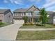 Charming two-story home with a well-manicured lawn, inviting entrance, and two car garage at 617 Hiddenbrook Dr, Durham, NC 27703