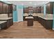 Spacious kitchen with lots of cabinet space, a kitchen island, and granite countertops at 617 Hiddenbrook Dr, Durham, NC 27703