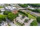 View of the brick building with trees, roads and cars at 710 Independence Pl # 103, Raleigh, NC 27603