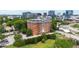 Aerial view showcases the building nestled in a vibrant urban setting at 710 Independence Pl # 103, Raleigh, NC 27603