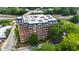 High angle shot of the building with trees and a road at 710 Independence Pl # 103, Raleigh, NC 27603