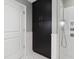 Modern bathroom boasts a sleek walk-in shower and custom cabinets for ample storage at 710 Independence Pl # 103, Raleigh, NC 27603