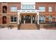 Elegant brick building entrance with grand doors and accessible ramp at 710 Independence Pl # 103, Raleigh, NC 27603