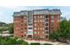 Beautiful brick building with charming architectural details and multiple balconies at 710 Independence Pl # 103, Raleigh, NC 27603