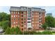 Beautiful red brick building with multiple balconies and detailed architecture at 710 Independence Pl # 103, Raleigh, NC 27603
