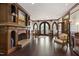 Lobby with fireplace, dark wood floors, and unique windows at 710 Independence Pl # 103, Raleigh, NC 27603