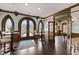 Lobby featuring dark wood floors, gothic style windows, and seating at 710 Independence Pl # 103, Raleigh, NC 27603