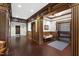 Lobby space with dark wood floors, wainscotting, and elevator access at 710 Independence Pl # 103, Raleigh, NC 27603