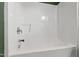 Bathroom features a white tub/shower combo with chrome faucet and fixtures at 717 Samuel Cary Dr, Cary, NC 27511