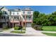 Charming townhome with a brick facade, private balcony, and well-manicured lawn at 717 Samuel Cary Dr, Cary, NC 27511
