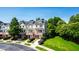 A street view of the town homes and landscaping at 717 Samuel Cary Dr, Cary, NC 27511