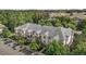 Aerial view of apartment building and surrounding trees and parking at 735 Portstewart Dr, Cary, NC 27519