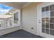 Outdoor balcony showing the siding of the house with dark floors and window at 735 Portstewart Dr, Cary, NC 27519
