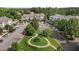Exterior view showcasing well-maintained apartment buildings, with attractive landscaping and parking areas at 735 Portstewart Dr, Cary, NC 27519