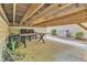 View of unfinished basement featuring concrete flooring, exposed joists and access to the home's utilities at 736 Varina Ln, Fuquay Varina, NC 27526