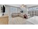 Living room featuring natural light, carpet flooring, a ceiling fan and a comfortable couch at 736 Varina Ln, Fuquay Varina, NC 27526