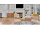 Cozy living room features a fireplace, built-in shelving, and comfortable seating at 736 Varina Ln, Fuquay Varina, NC 27526