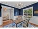 Bright office with a large window, a modern desk, and a comfortable seating area at 736 Varina Ln, Fuquay Varina, NC 27526
