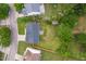 Birds eye view of a backyard featuring a stone fire pit, shed, and fencing at 7612 Vista Del Rey Ln, Raleigh, NC 27613