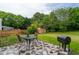 Outdoor space with table and grill at 7612 Vista Del Rey Ln, Raleigh, NC 27613