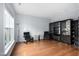Bright living room with hardwood floors, large windows, and modern furnishings at 7612 Vista Del Rey Ln, Raleigh, NC 27613