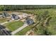 Two-story home on a large lot with a well-kept lawn, a fenced backyard, and an attached two-car garage at 784 Cypress Rd, Cameron, NC 28326