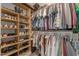 Organized walk-in closet with shelving and hanging rods offering ample storage space at 784 Cypress Rd, Cameron, NC 28326