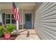 Charming front door with glass and inviting decor plus a Ring security system at 784 Cypress Rd, Cameron, NC 28326