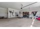 Spacious two car garage with white walls and plenty of room for storage and parking at 784 Cypress Rd, Cameron, NC 28326