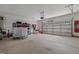Spacious two car garage with white walls and plenty of room for storage and parking at 784 Cypress Rd, Cameron, NC 28326