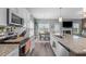 Bright kitchen features granite countertops, stainless steel appliances, and an adjacent dining area at 784 Cypress Rd, Cameron, NC 28326