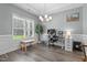 Bright office space with a large window, desk, and modern decor at 784 Cypress Rd, Cameron, NC 28326