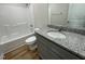 Charming bathroom showcasing granite countertop and bathtub at 81 Coharie Dr, Lillington, NC 27546