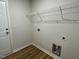 Functional laundry room featuring built-in shelving and easy access to hookups at 81 Coharie Dr, Lillington, NC 27546