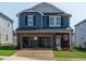 Charming two-story home featuring a spacious two-car garage and well-manicured lawn at 837 Ottawa Dr, Garner, NC 27529
